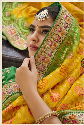 Yellow woven silk saree with blouse 2