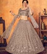 Shubhkala Prepossessing Dusty Rose Pink Thread With Sequins Embroidered Net Semi Stitched Party Lehenga