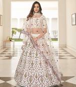 Glamorous White Thread And Sequins Embroidered Silk Party Wear Lehenga