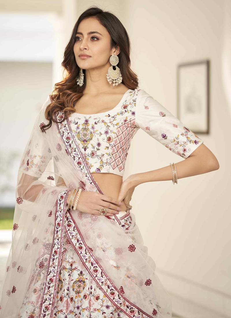 Glamorous White Thread And Sequins Embroidered Silk Party Wear Lehenga