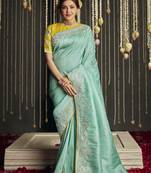 Light sea green embroidered pure silk saree with blouse