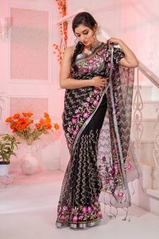 The ever charming colour is sure to charm you yet again. This black resham silk handwoven saree