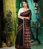 Bold and enchanting is what you will look in this black matka handwoven saree.