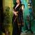 You are sure to look confident and glamorous in this black cotton handwoven saree. It has small motifs woven all over.