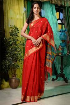 Reflect your bright persona in this red cotton handwoven hand spun saree. It has small zari motifs woven all over.