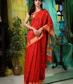 Reflect your bright persona in this red cotton handwoven hand spun saree. It has small zari motifs woven all over.