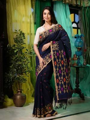 Look dainty and charming in this navy blue linen handwoven saree. It has small motifs woven all over. 1