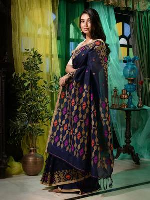Look dainty and charming in this navy blue linen handwoven saree. It has small motifs woven all over. 3