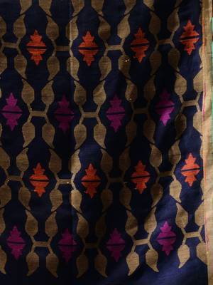Look dainty and charming in this navy blue linen handwoven saree. It has small motifs woven all over. 6