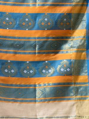 Ethnic patterns with modern colour combinations are reflected in this beige cotton hand spun handwoven saree. 6