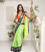 Green Silk Saree With Blue Zari Border