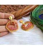 Gold tone pink party wear studs dj-01603