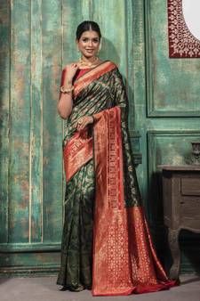 Green woven banarasi silk saree with blouse