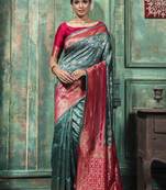 Sea green woven Banarasi silk blend saree with blouse