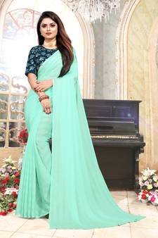 Turquoise Woven Silk Blend Saree With Blouse