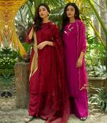 Blue A-line kurta with hem and embroidery detail paired with palazzo and dupatta