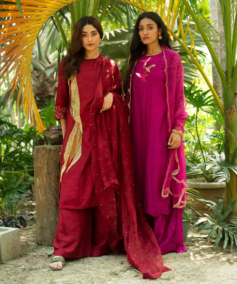 Blue A-line kurta with hem and embroidery detail paired with palazzo and dupatta