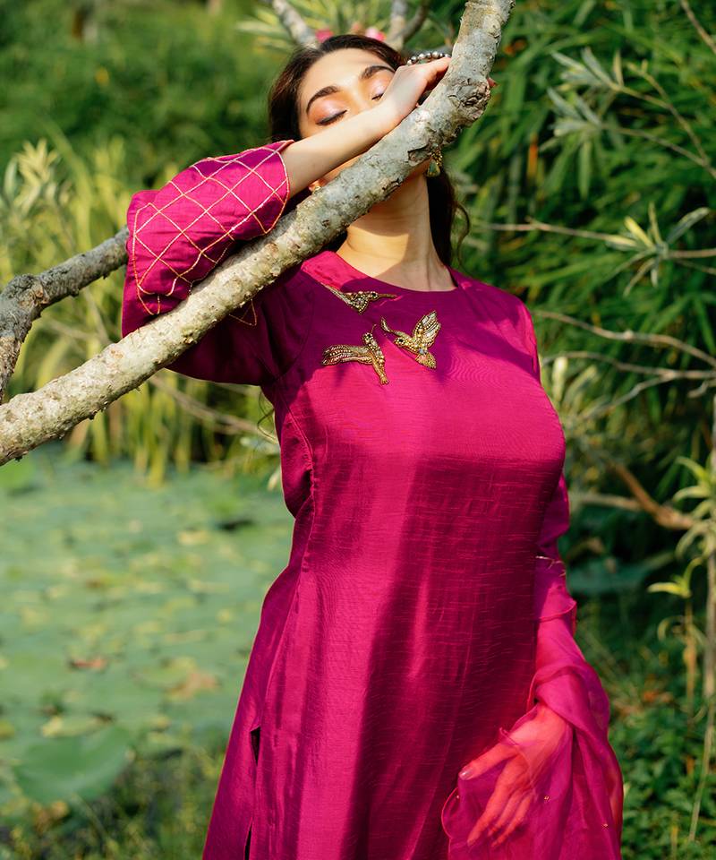 Blue A-line kurta with hem and embroidery detail paired with palazzo and dupatta