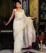 White  handloom saree with sequins and  zari border