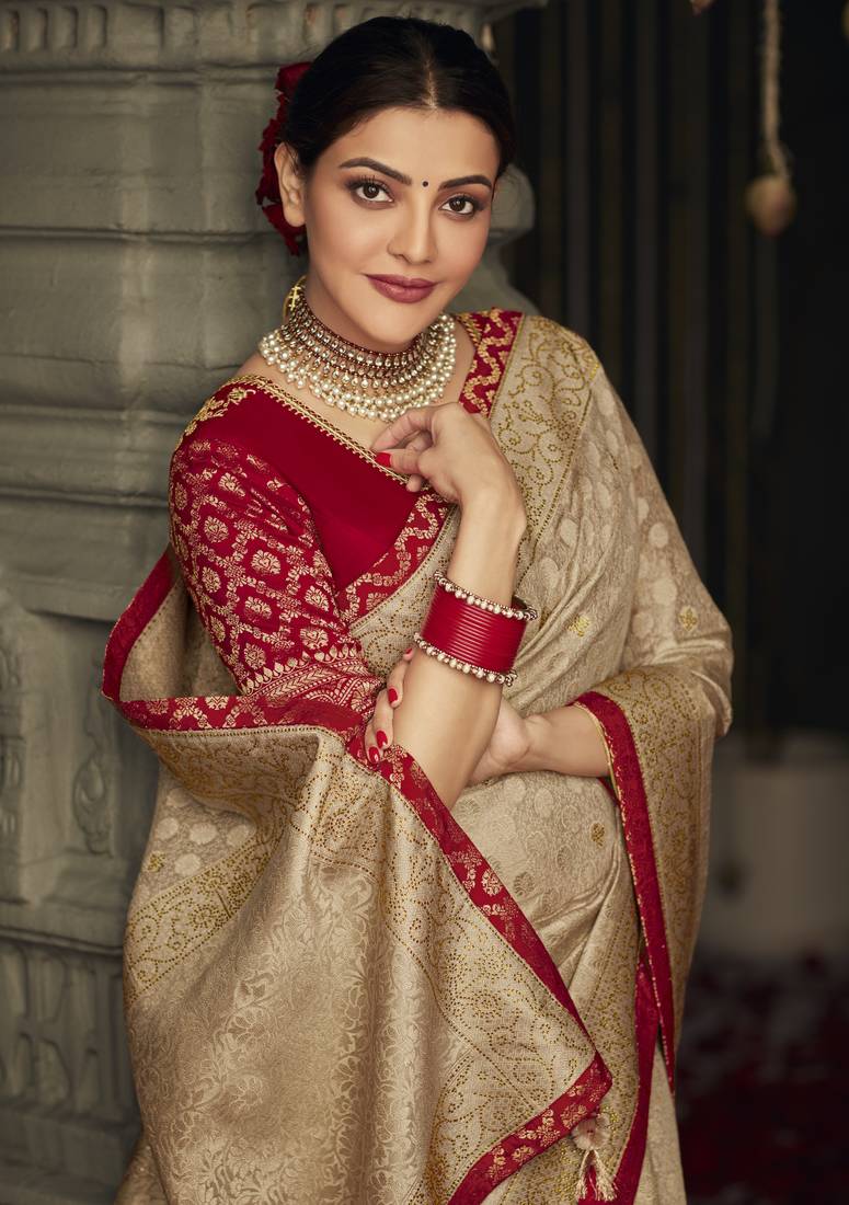 Beige embroidered pure silk saree with blouse