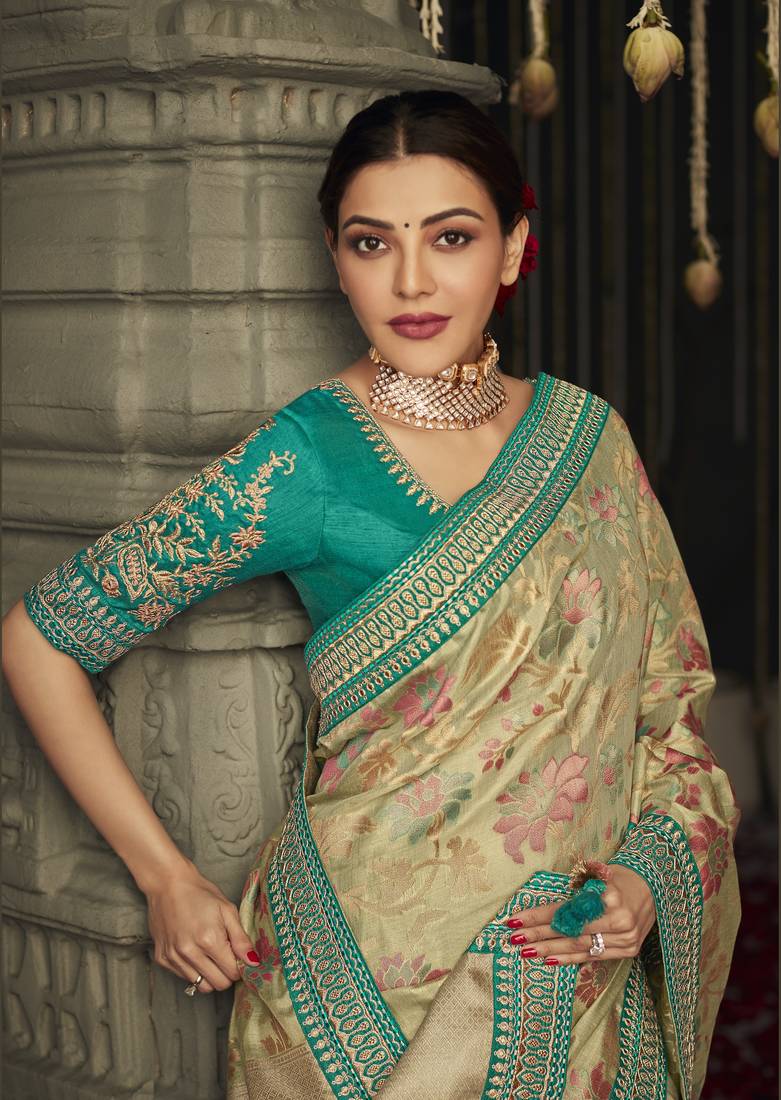 Beige embroidered pure silk saree with blouse