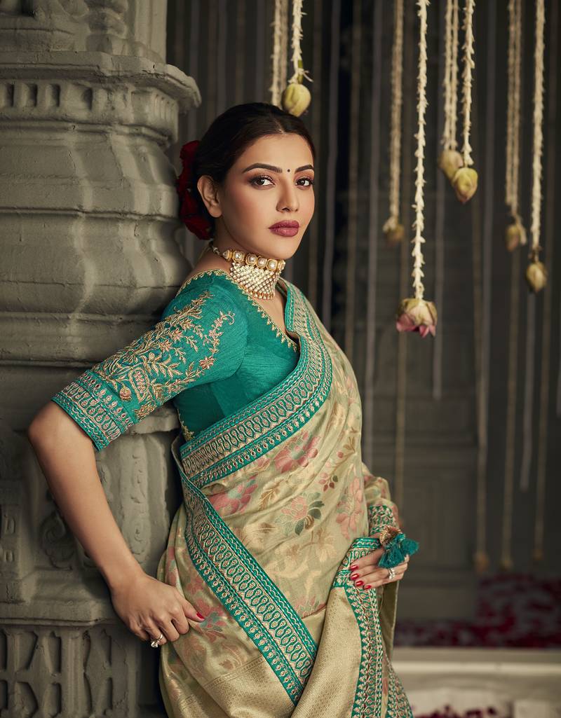 Beige embroidered pure silk saree with blouse