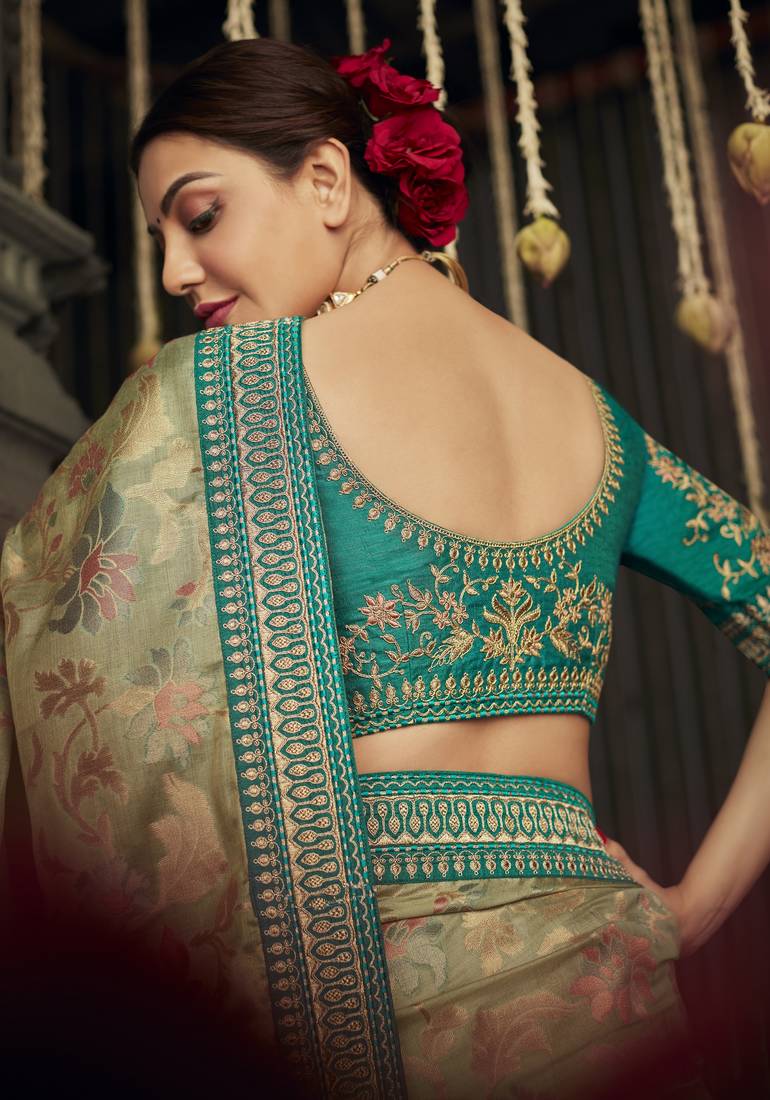 Beige embroidered pure silk saree with blouse