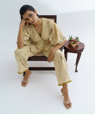 beige khadi co ord set with printed overlay design 4