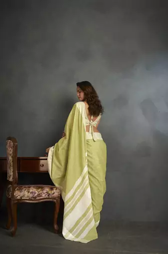 Light yellow woven linen saree with blouse