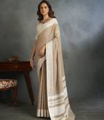 Light brown woven linen saree with blouse