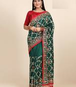 Green embroidered silk blend saree with blouse
