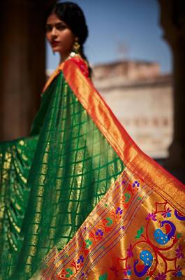 Green woven silk saree with blouse 2