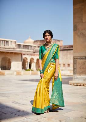 Yellow woven silk saree with blouse 1