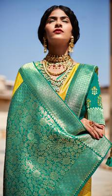 Yellow woven silk saree with blouse 2