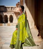 Light green woven silk saree with blouse