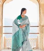 Off white woven silk saree with blouse