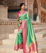 Light green woven silk saree with blouse