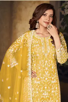 Yellow embroidered net salwar kameez