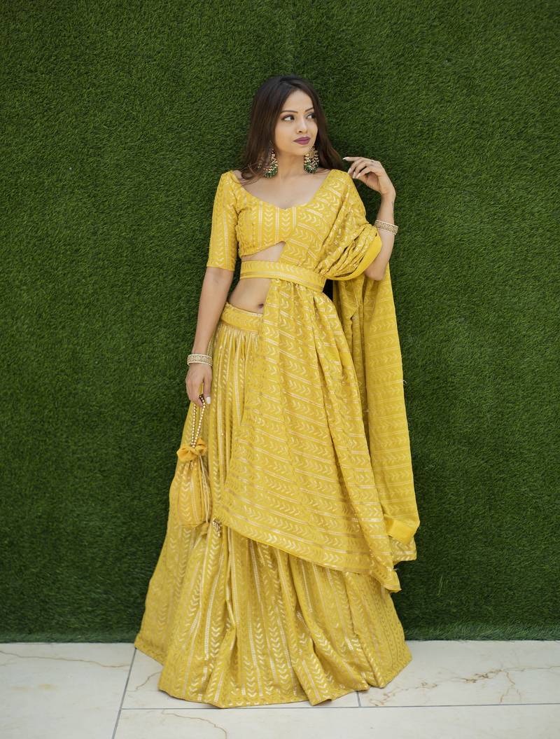 Women's wear yellow colour semi-stitched lehenga choli with dupatta