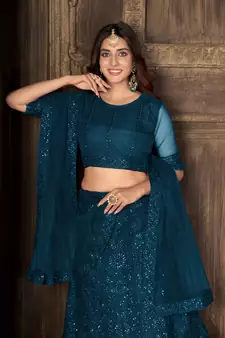 Turquoise embroidered net  lehenga