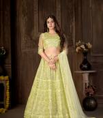 Yellow embroidered net semi stitched lehenga