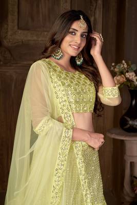 Yellow embroidered net semi stitched lehenga 4