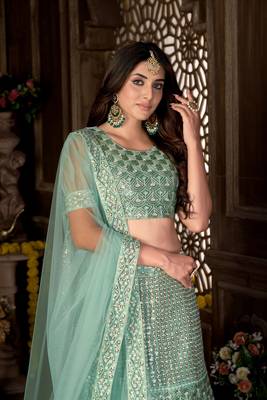 Green embroidered net  lehenga 4