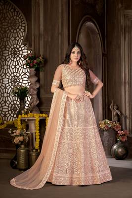 Peach embroidered net semi stitched lehenga 1