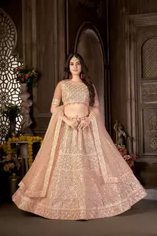Peach embroidered net semi stitched lehenga