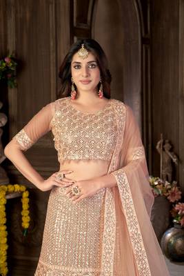 Peach embroidered net semi stitched lehenga 4