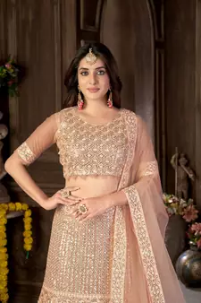 Peach embroidered net semi stitched lehenga