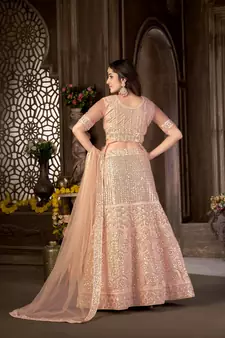 Peach embroidered net semi stitched lehenga