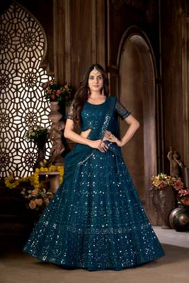 Teal embroidered net  lehenga 3