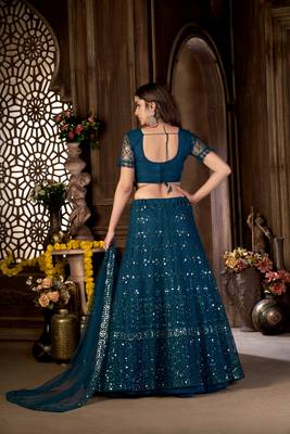 Teal embroidered net  lehenga 4